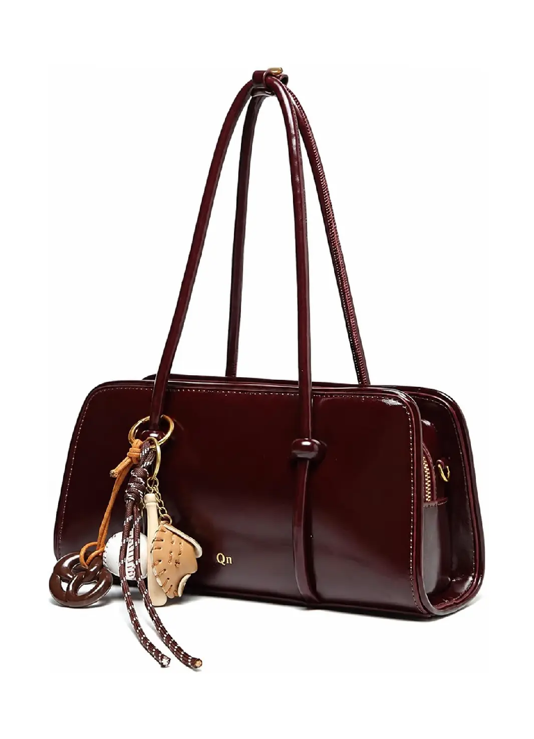Q&N glossy burgundy bowling bag with twin handles and decorative charms